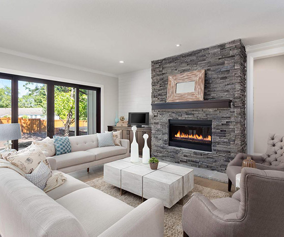 Beautiful living room with stone fireplace