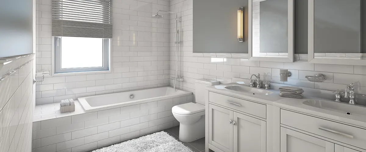 A white bathroom with a large vanity and a shower and tub combo