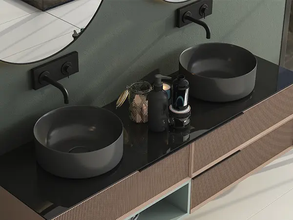 Dark countertop with beautiful vessel sinks