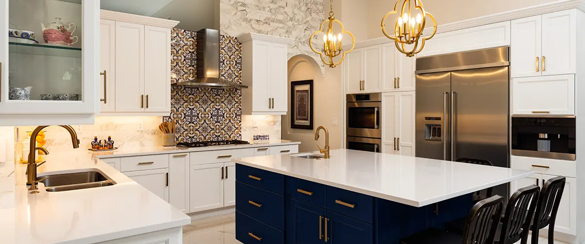 Navy blue kitchen island with white kitchen cabinets