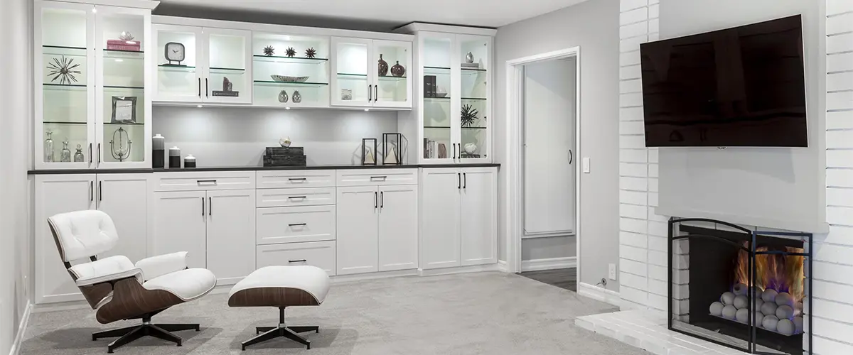 Interior Remodeled With White Cabinets With Glass Doors