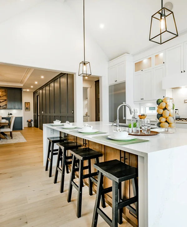 kitchen remodeling burien wa modern kitchen with white cabinetry marble island pendant lighting hardwood flooring