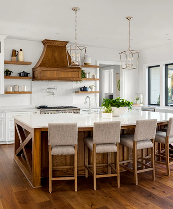 kitchen remodeling mountlake terrrace wa luxurious kitchen with white cabinetry wood island marble countertops and pendant lighting